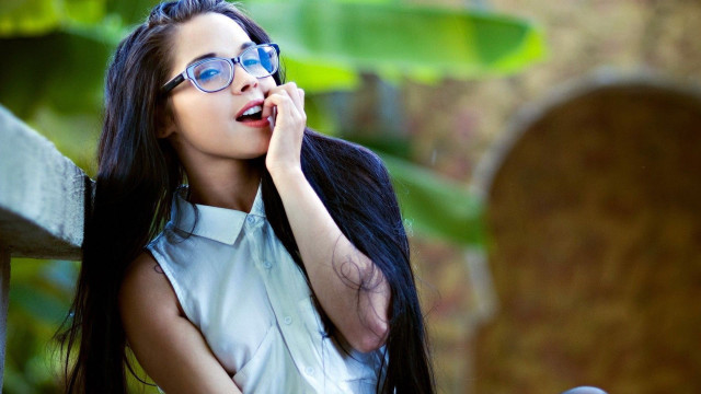 Woman long hair glasses cell free wallpaper - medium preview image