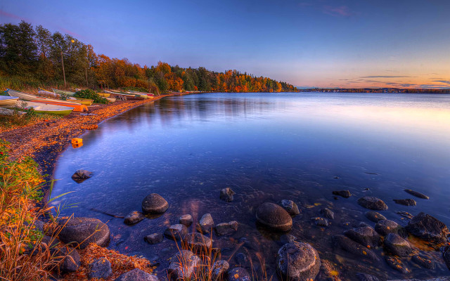 Lake rocks trees sunset boat free wallpaper - medium preview image
