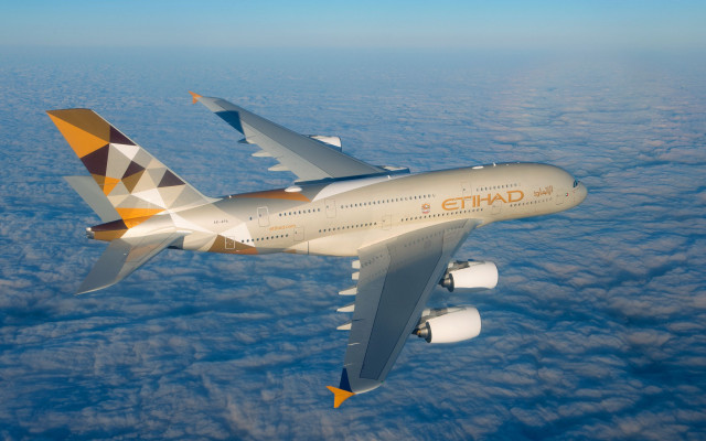 Ei q jetliner cloudy sky #2 free wallpaper - medium preview image