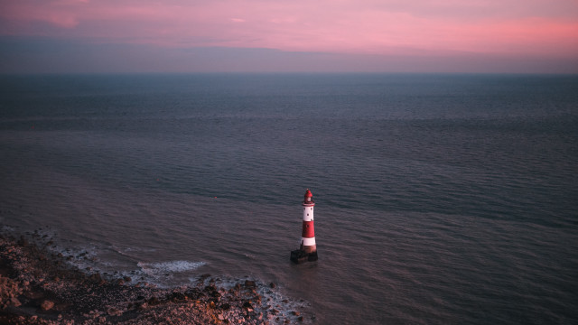 Lighthouse rocky beach sunset ocean #3 free wallpaper - medium preview image