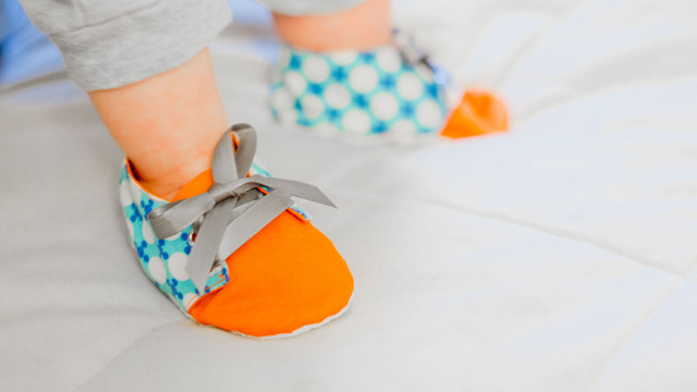 Person shoes bed sheet scissors free wallpaper - medium preview image