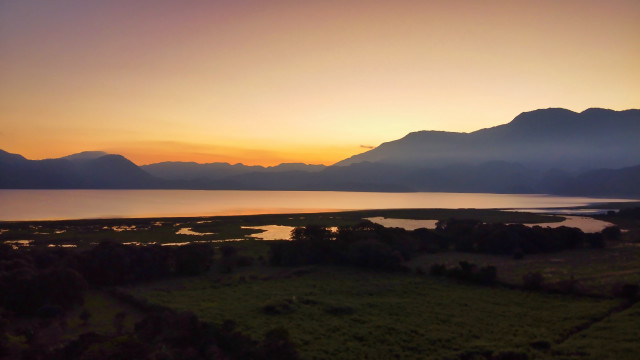 Sunset lake mountains field trees free wallpaper - medium preview image