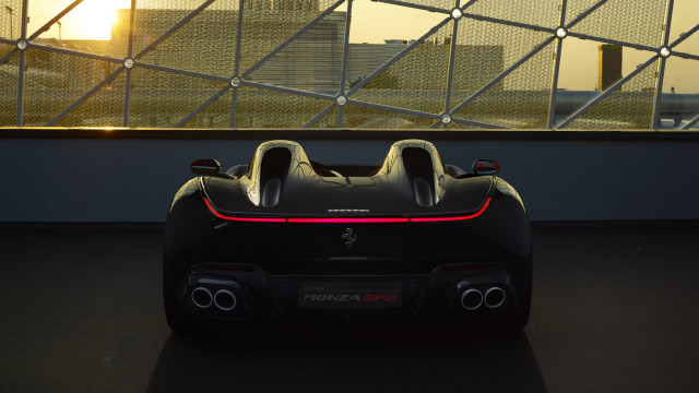 Black sports car window city free wallpaper - medium preview image