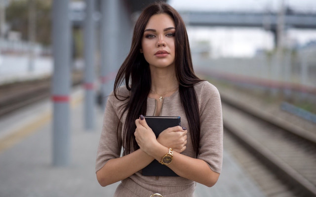 Woman book train platform bokeh free wallpaper - medium preview image