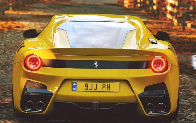 Yellow sports car forest leaves free wallpaper - medium preview image