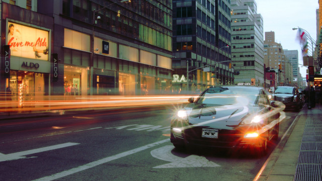 Futuristic cityscape policecar tiltshift neon free wallpaper - medium preview image