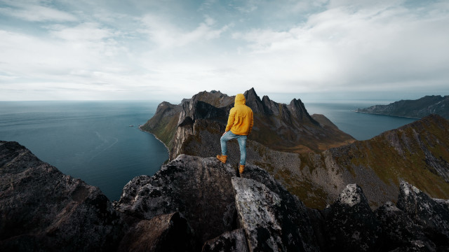 Mountain yellow jacket water sky free wallpaper - medium preview image