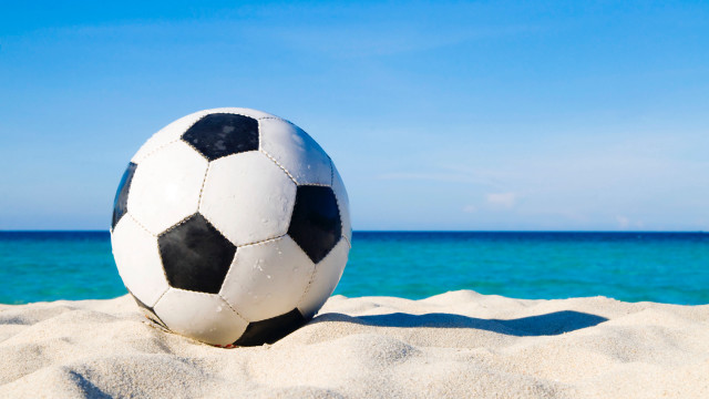 Soccer ball beach ocean sunny free wallpaper - medium preview image