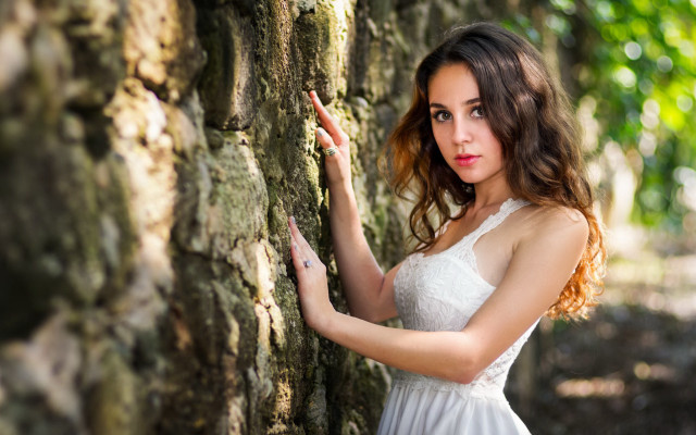 Woman white dress leaning wall #11 free wallpaper - medium preview image