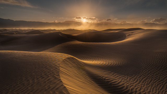 Sunset desert mountains clouds ocean free wallpaper - medium preview image
