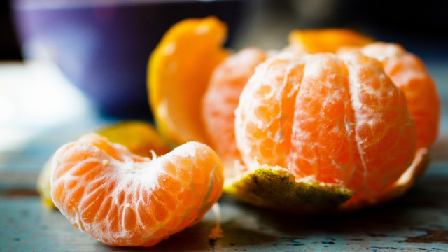Peeled orange on counter bowl free wallpaper - medium preview image