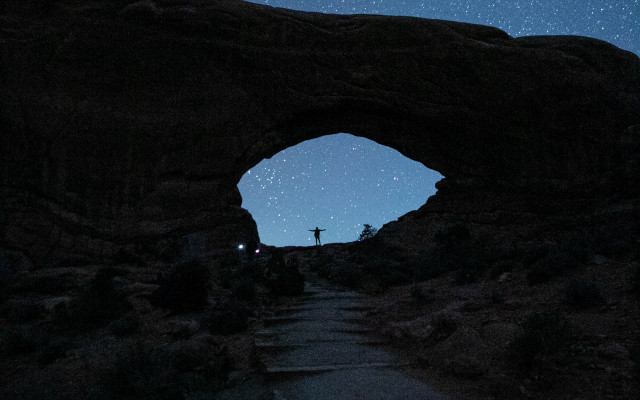 Cave star gazing astronaut night free wallpaper - medium preview image