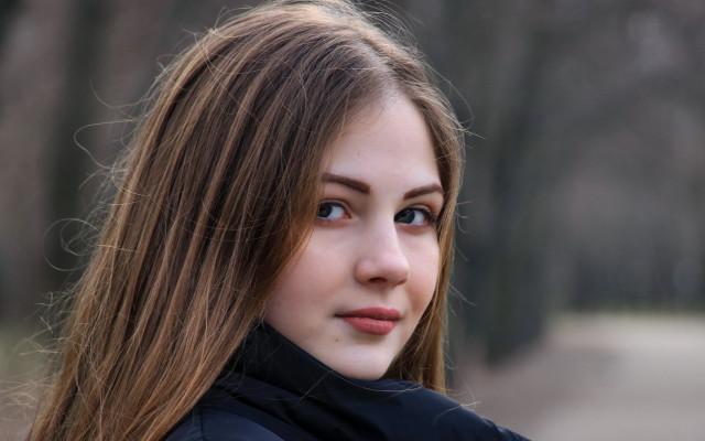 Woman longhair blackjacket serious blueeyes free wallpaper - medium preview image