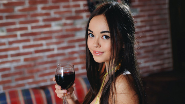 Woman smiling wine glass brick #2 free wallpaper - medium preview image