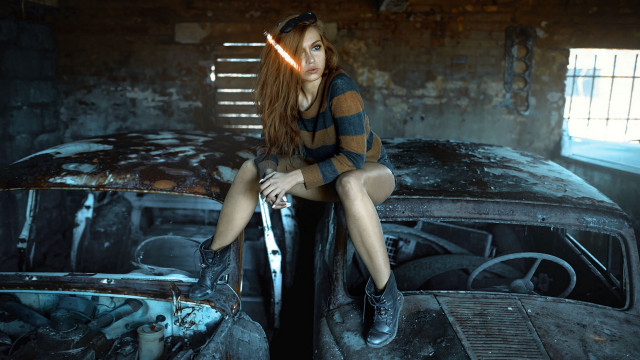 Woman sitting on car light free wallpaper - medium preview image