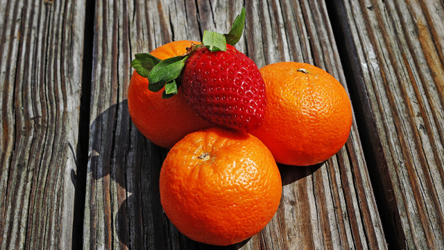 Three oranges strawberry wooden table free wallpaper - medium preview image