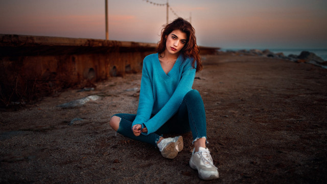 Woman sitting water background portrait free wallpaper - medium preview image