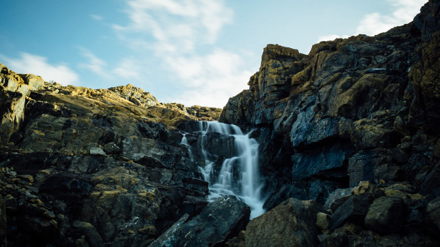 Waterfall cliff blue sky clouds free wallpaper - medium preview image