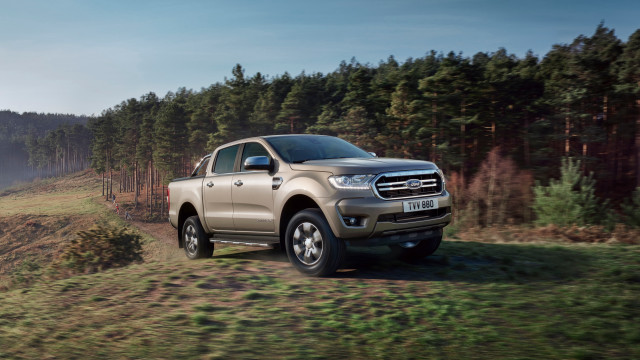 Silver truck dirt road forest free wallpaper - medium preview image