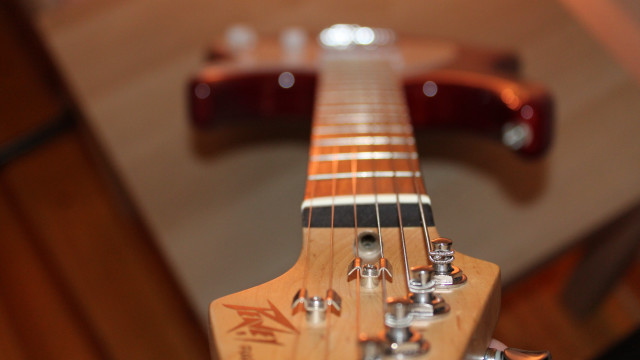 Guitar neck closeup bokeh shallow free wallpaper - medium preview image