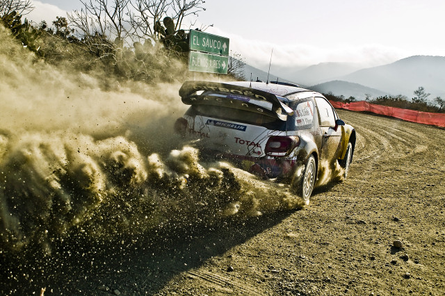 Car driving dirt road dust #2 free wallpaper - medium preview image