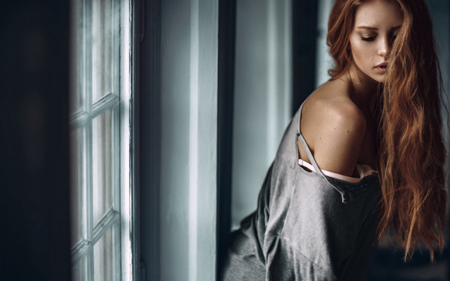 Red haired woman leaning wall free wallpaper - medium preview image