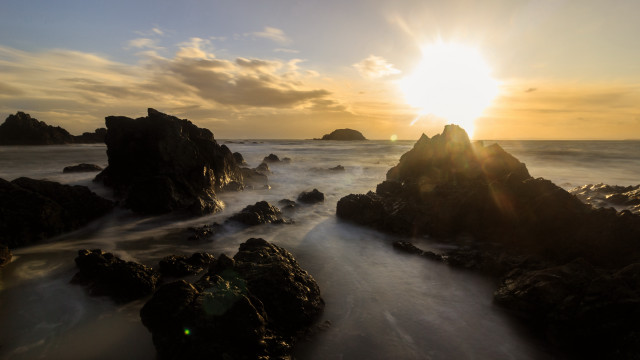 Sunset ocean rocks water islands free wallpaper - medium preview image
