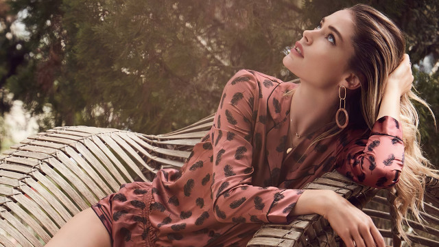 Woman sitting bench dress earrings free wallpaper - medium preview image