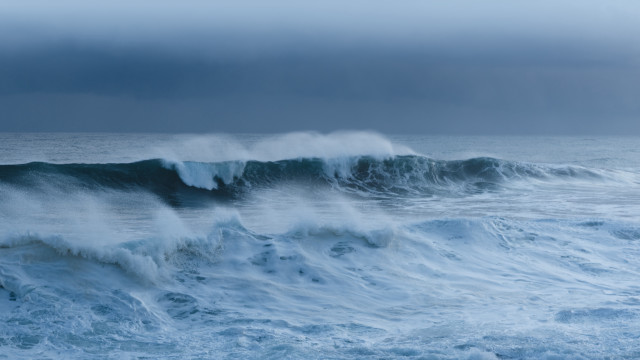 Stormy ocean wave surfing cloudy free wallpaper - medium preview image