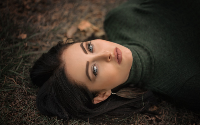 Woman lying outdoors blurry blueeyes free wallpaper - medium preview image