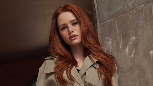 Red haired woman wall serious free wallpaper - medium preview image
