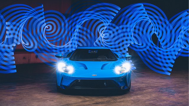 Blue sports car lighted wall free wallpaper - medium preview image