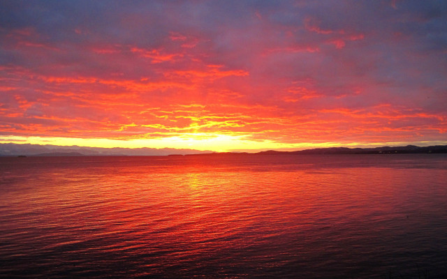 Sunset mountains water boat sky free wallpaper - medium preview image