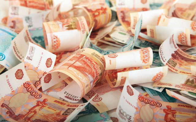 Indian currency scattered rolled blurry free wallpaper - medium preview image
