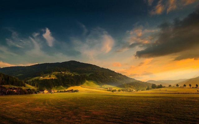 Sunset green valley mountain clouds free wallpaper for desktop - medium preview image
