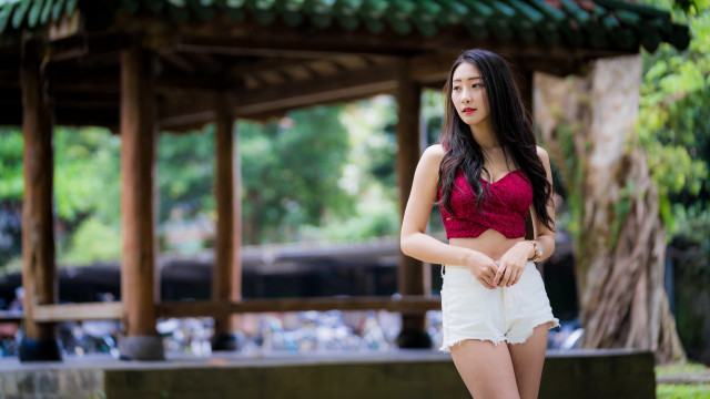 Woman red top white shorts free wallpaper - medium preview image