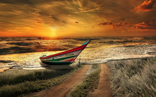 Boat beach sunset mountain ocean free wallpaper - medium preview image