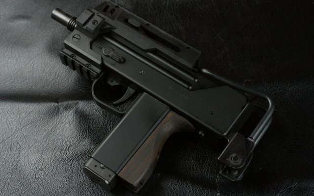 Gun black leather background precisionism free wallpaper - medium preview image