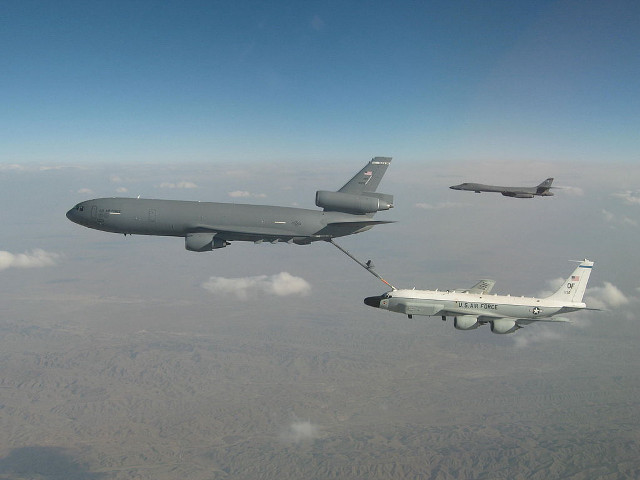 Military plane towing another plane free wallpaper - medium preview image