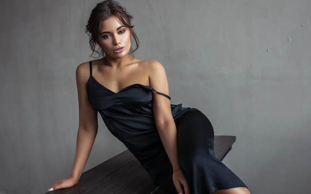 Woman black dress sitting table free wallpaper for desktop - medium preview image