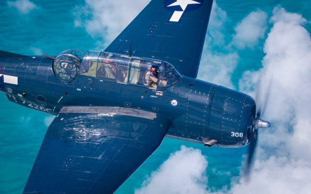 Blue airplane cockpit people sky free wallpaper - medium preview image