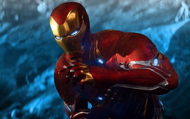 Man red suit golden object free wallpaper - medium preview image