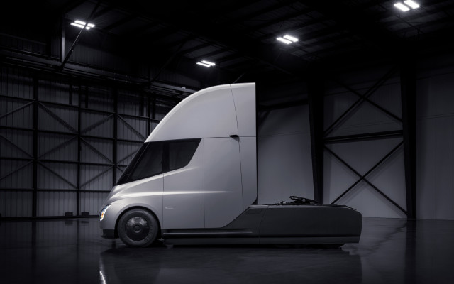 White semi truck garage panfuture free wallpaper - medium preview image