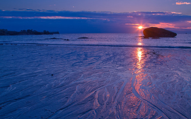 Sunset water rock distant bridge free wallpaper - medium preview image