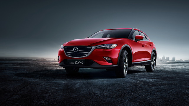 Red car parking lot city free wallpaper - medium preview image