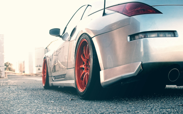 Car red rims stylized building free wallpaper - medium preview image