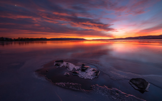 Sunset lake rock clouds cityscape free wallpaper - medium preview image