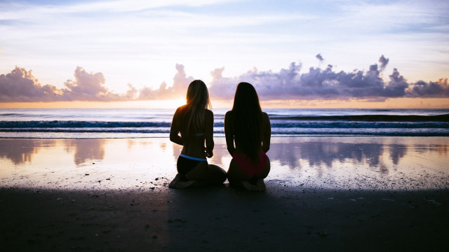 Beach sunset two women horizon free wallpaper - medium preview image