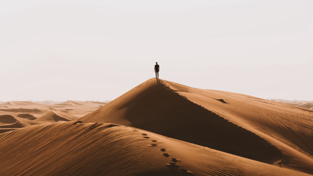 Desert figure sunset footprints sky free wallpaper - medium preview image