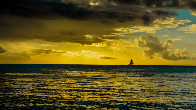Sailboat ocean sunset cloudy sky #5 free wallpaper - medium preview image